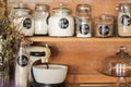 Baking ingredients displayed on an antique kitchen hutch. A stylish way to store your staples like flour, sugar etc