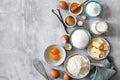 Baking ingredients: flour, eggs, sugar, butter, milk and spices