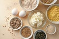 Baking ingredients for a healthy protein bread with whole grain flour, seeds, curd cheese and eggs, low carb recipe for obesity