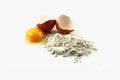 Baking ingredients like flour and eggs isolated on white background Royalty Free Stock Photo