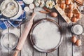 Baking ingredients on rustic wood background Royalty Free Stock Photo