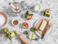 Baking ingredients - whole wheat flour, apples, butter, sugar, cinnamon. Royalty Free Stock Photo