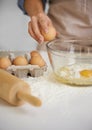 Baking, kitchen and person with eggs and flour for cake, bread and pastry preparation in home. Culinary, bakery and Royalty Free Stock Photo