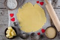 Baking love heart cookies for Valentine day. Top view