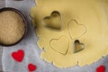 Baking love heart cookies for Valentine day. Top view