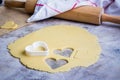 Baking love heart cookies for Valentine day. Top view Royalty Free Stock Photo