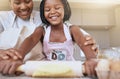 Baking, mother and child helping in the kitchen, learning and smile for rolling dough together in a house. Food, happy Royalty Free Stock Photo
