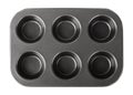 Baking pan for muffins, cupcake baking dish Royalty Free Stock Photo