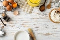 Baking pastry background frame, ingredients, kitchen utensils on rustic wooden background