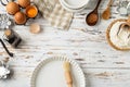 Baking pastry background frame, ingredients, kitchen utensils on rustic wooden background
