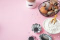Baking pastry background, ingredients, kitchen utensils on light pink background, flat lay