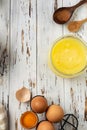 Baking pastry background vertical, ingredients, kitchen utensils on rustic wooden background