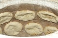 Baking pita bread in a stone oven Royalty Free Stock Photo