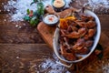 Baking pot with roasted poultry legs