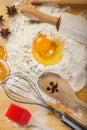 Baking preparation: eggs, flour, rolling pin, the mixer board