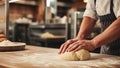 Baker Hands Kneading Dough in Bakery to Bake Fresh Bread or Pastries, Close-up Royalty Free Stock Photo