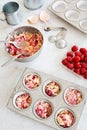 Baking Raspberry Cupcakes or Muffins Royalty Free Stock Photo