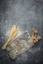 Baking recipe background, sprinkled wheat flour, grain and ears on wooden board. Cooking dough, vertical image. top view. place Royalty Free Stock Photo