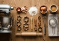 Baking setup on a wooden table with a silver stand mixer, Royalty Free Stock Photo