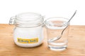 Baking soda in jar, spoonful and glass of water for multiple hol Royalty Free Stock Photo