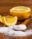 Baking soda (sodium bicarbonate) in a wooden spoon Royalty Free Stock Photo