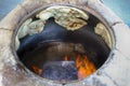 Baking tandoor bread in arabic tandoor in Israel. Traditional arabic Laffa bread