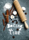Baking time. Flour sprinkled on the blue table with text baking time. Baking ingredient Royalty Free Stock Photo