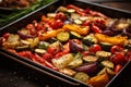 baking tray with assortment of roasted veggies Royalty Free Stock Photo