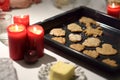 Baking tray with christmas cookies. Cooking of biscuits for Xmas holidays