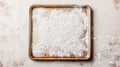 A baking tray with a dusting of flour on a light surface Royalty Free Stock Photo