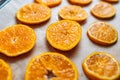 tangerine orange slice on baking sheet Royalty Free Stock Photo