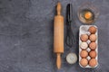 Baking utensils and ingredients on stone slate table Royalty Free Stock Photo