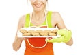 Baking woman showing cookies on tray Royalty Free Stock Photo