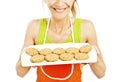 Baking woman showing cookies on tray Royalty Free Stock Photo