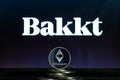 Bakkt logo with Ethereum coin