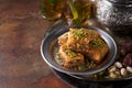 Baklava or baklawa, Ramadan Dessert. Traditional Arabic dessert with pistachios, honey and mint tea on dark surface Royalty Free Stock Photo