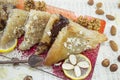 Baklava decorated with nuts, lemon and almonds