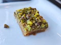 Baklava dessert with plenty of pistachios. catering presentation photo.