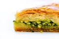 Baklava with pistachios, walnuts and honey on white background. Jewish, turkish, arabic traditional national dessert Royalty Free Stock Photo