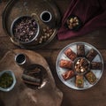 Baklava - turkish dessert with pistachio, almonds, cinamon, star anise on a table