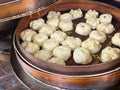 Bakpao, Baozi Steamed bun, pao, dim sum on In a bamboo, steamer. a type of yeast-leavened filled bun in various Chinese cuisines Royalty Free Stock Photo