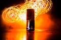 BAKU, AZERBAIJAN - April 20, 2018: Red Bull classic 250 ml can on dark toned foggy background. Red Bull is an energy drink sold by