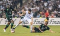 Qarabag winger Abdellah Zoubir against Ferencvaros players Anderson Esiti and Endre Botka against during UEFA Champions League Royalty Free Stock Photo