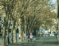 BAKU, AZERBAIJAN - Feb 27, 2020: Baku, Azerbaijan - 27.02.2020: Happy family walking in city center, back side view