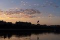 Baku, Azerbaijan - January 12, 2024: Panoramic sunset view over Baku. The view of seashore with a golden sunset light and sea