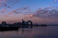 Baku, Azerbaijan - January 12, 2024: Panoramic sunset view over Baku. The view of seashore with a golden sunset light and sea