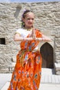 BAKU, Azerbaijan-JUNE 26, 2018: portrait of child in traditional Indian clothing, sari and jeweleries dancing