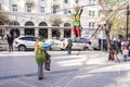 Baku, Azerbaijan-March 26, 2017: a Tightrope Walker and a clown perform a circus act on a city street during the Novruz holiday.