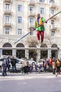 Baku, Azerbaijan-March 26, 2017: a Tightrope Walker and a clown perform a circus act on a city street during the Novruz holiday.