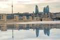 Baku, Azerbaijan- October 05, 2020: Baku Flame Towers skyscrapers, television tower and the seaside of the Caspian sea. Panorama